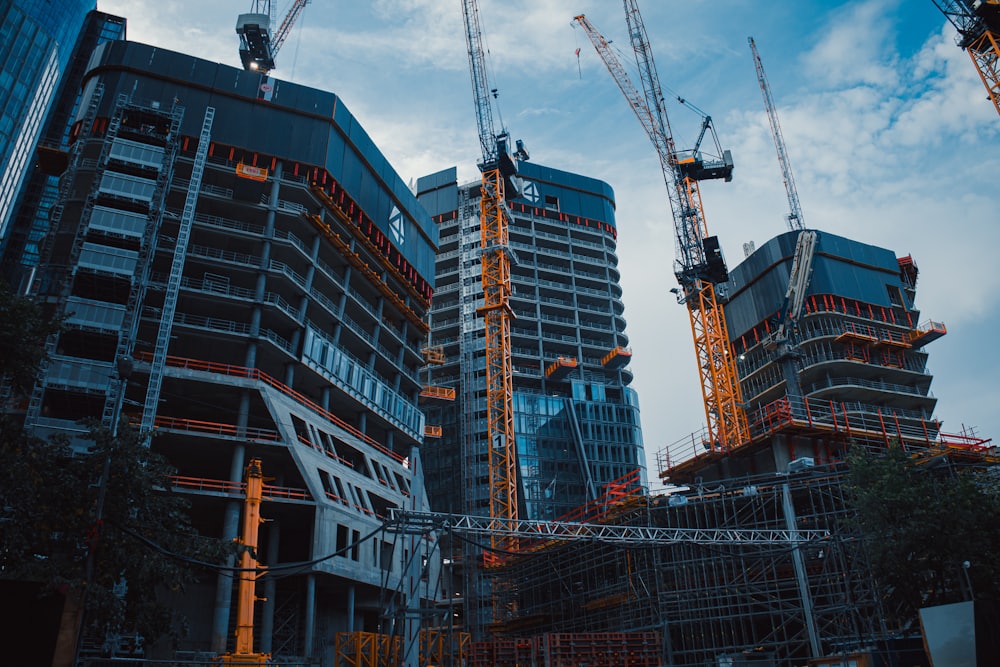 Cranes above a building under construction